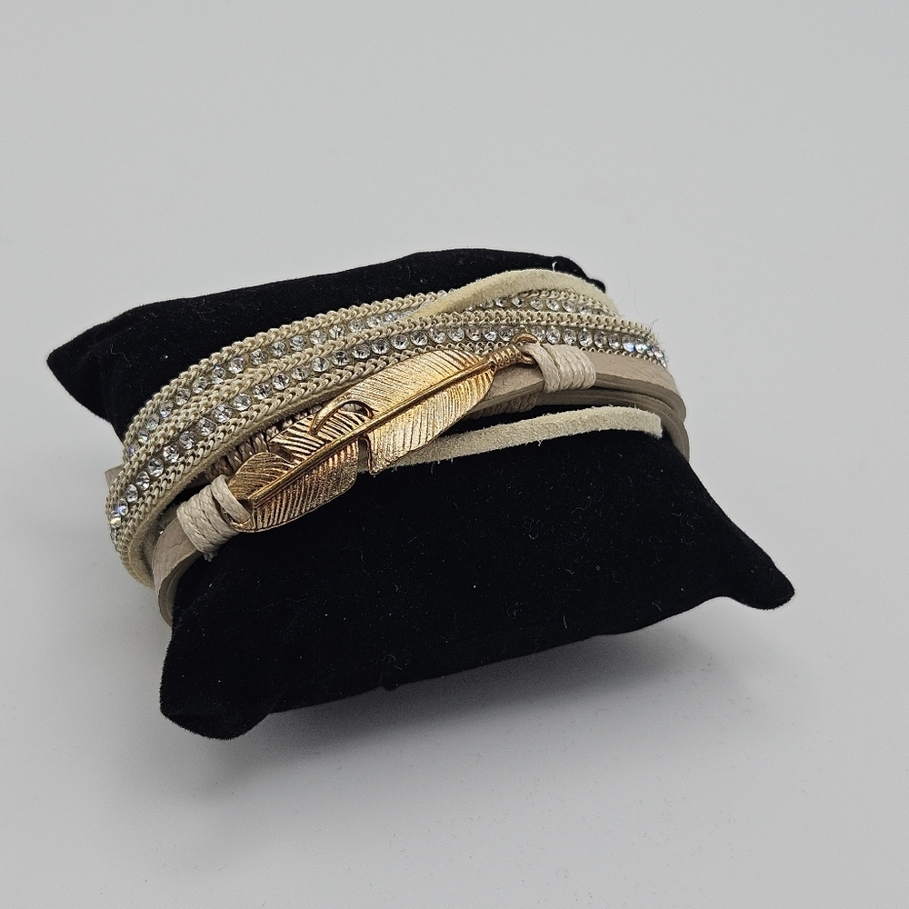 NWT 2 Chic cream and silver layered wrap bracelet with gold tone feather